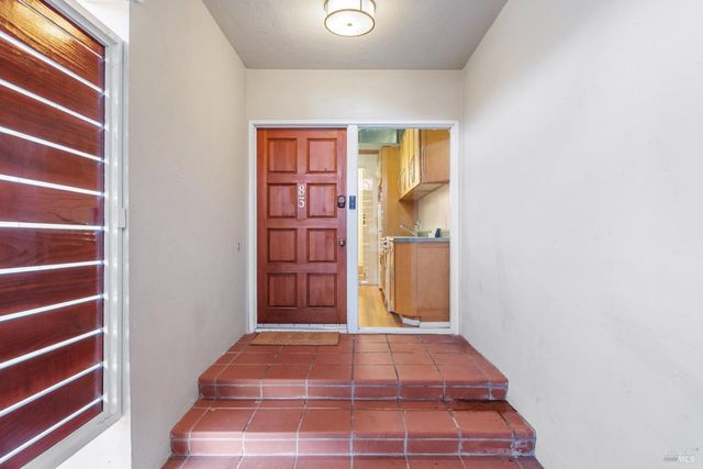 a front view of a multi story residential apartment building