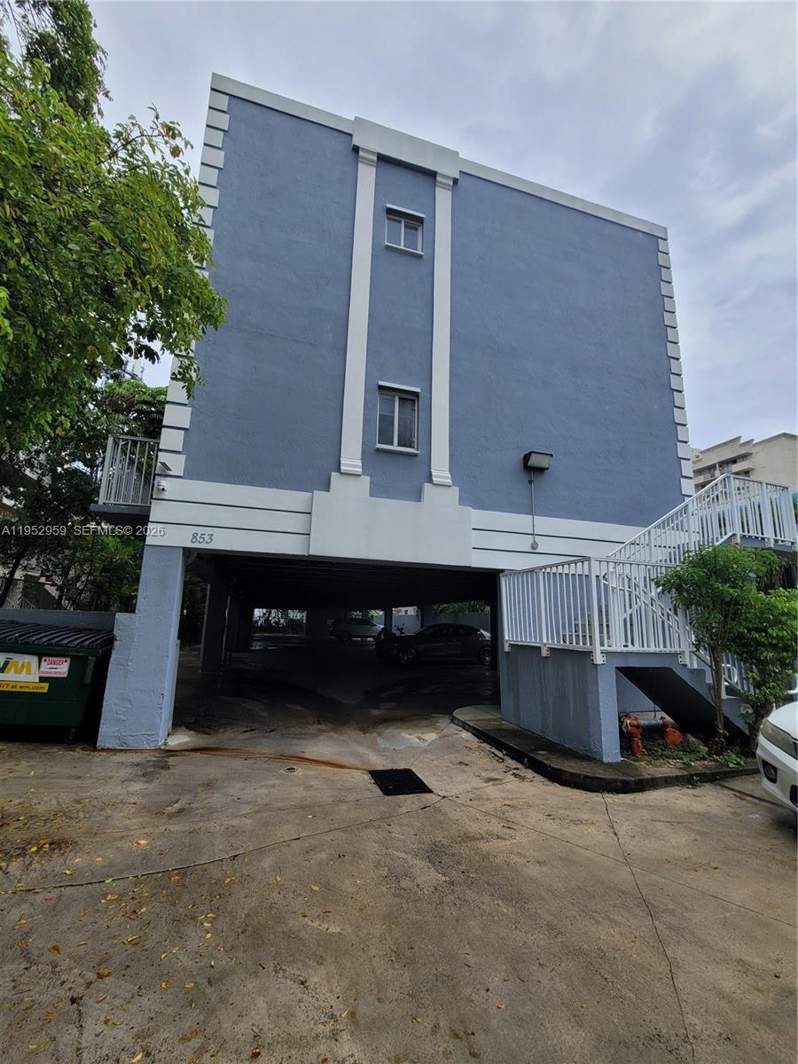 853 Southwest 2nd Street, Unit 207 Miami, FL 33130 - Photo 15 of 19 front view of a house with a street