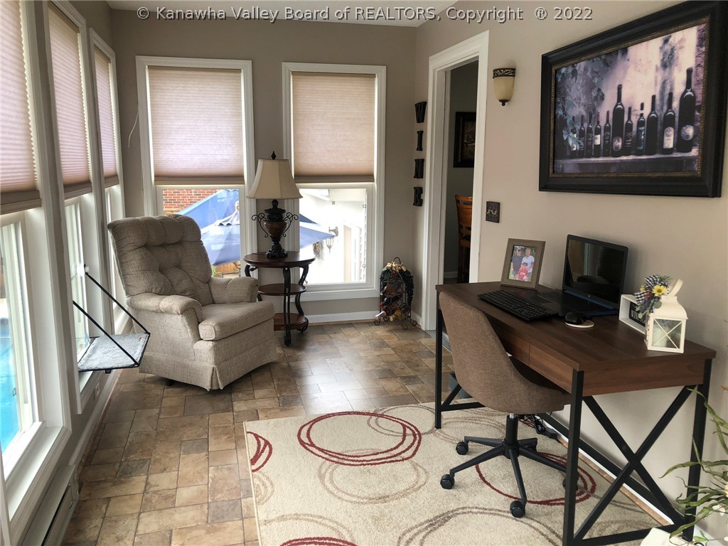 148 English Road East Point Pleasant, WV 25550 - Photo 8 of 44 SUNROOM WITH STEPS LEADING TO PATIO & POOL