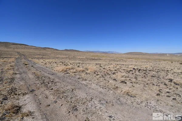 a view of an outdoor space and mountain view