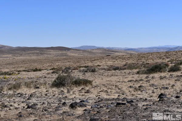 a view of mountains and valleys