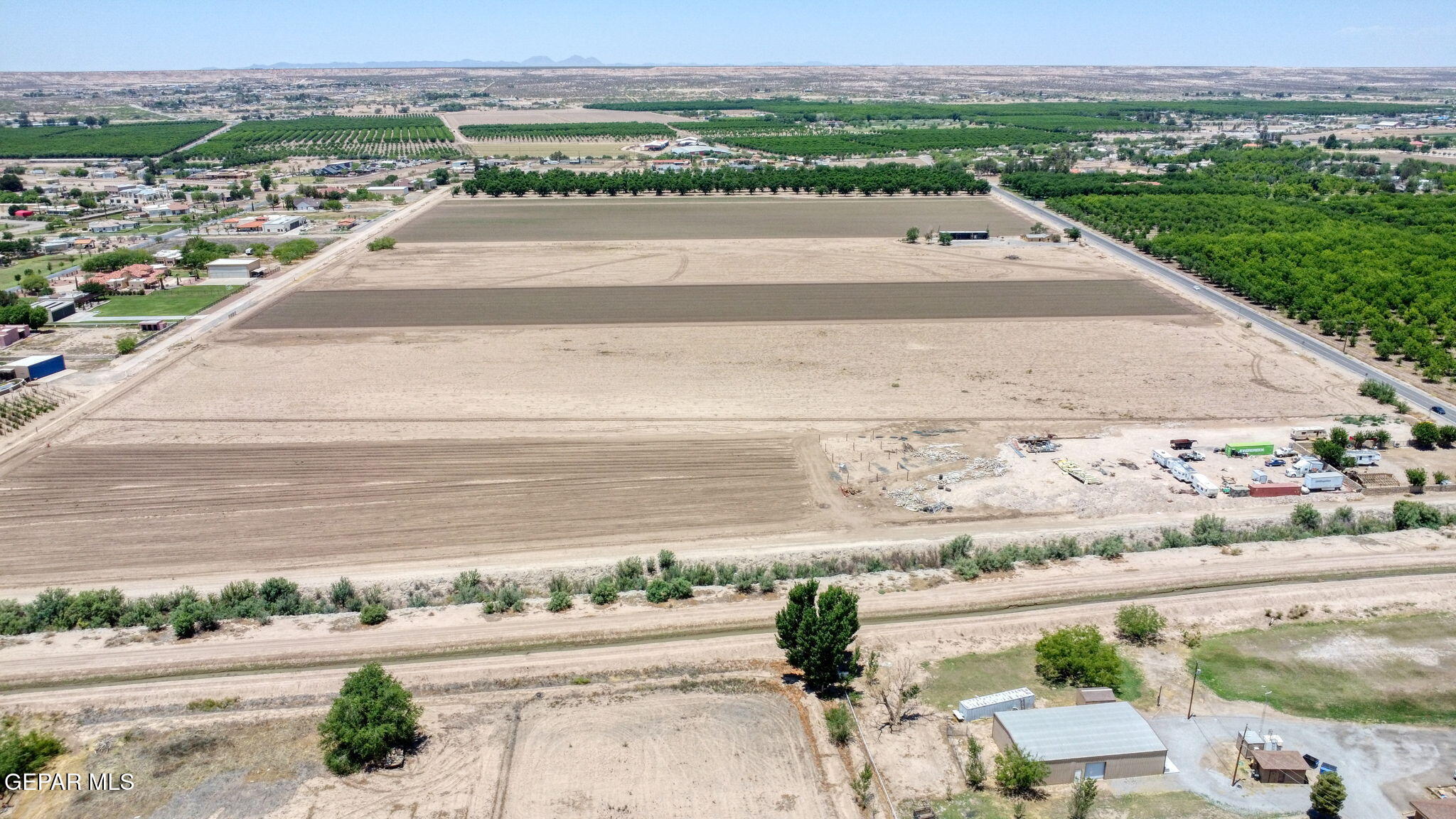 7036 McNutt Road Anthony, NM 88021 - Photo 17 of 23 an aerial view of a house with a yard and ocean view