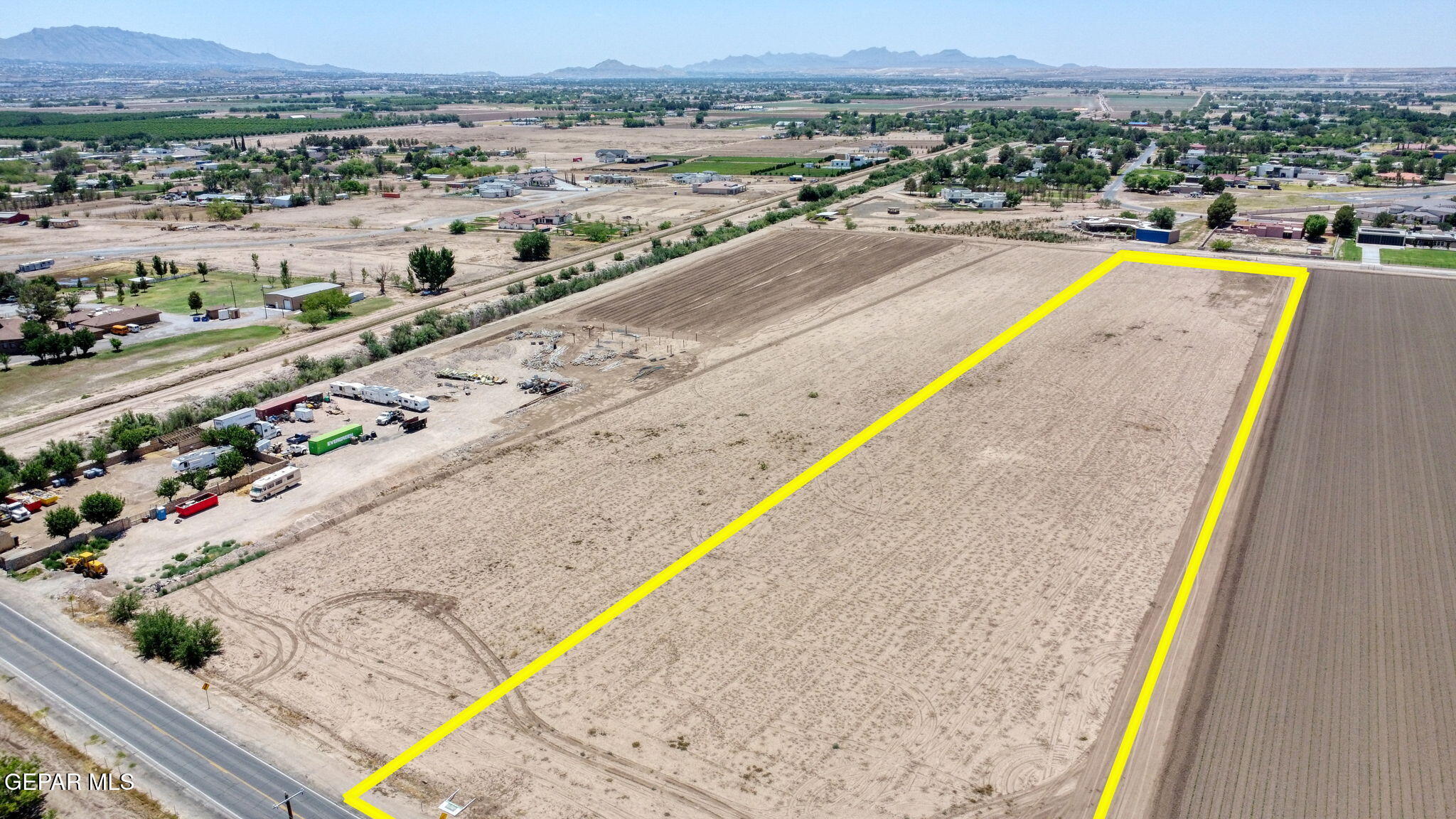 7036 McNutt Road Anthony, NM 88021 - Photo 5 of 23 a view of a swimming pool with a lounge chair