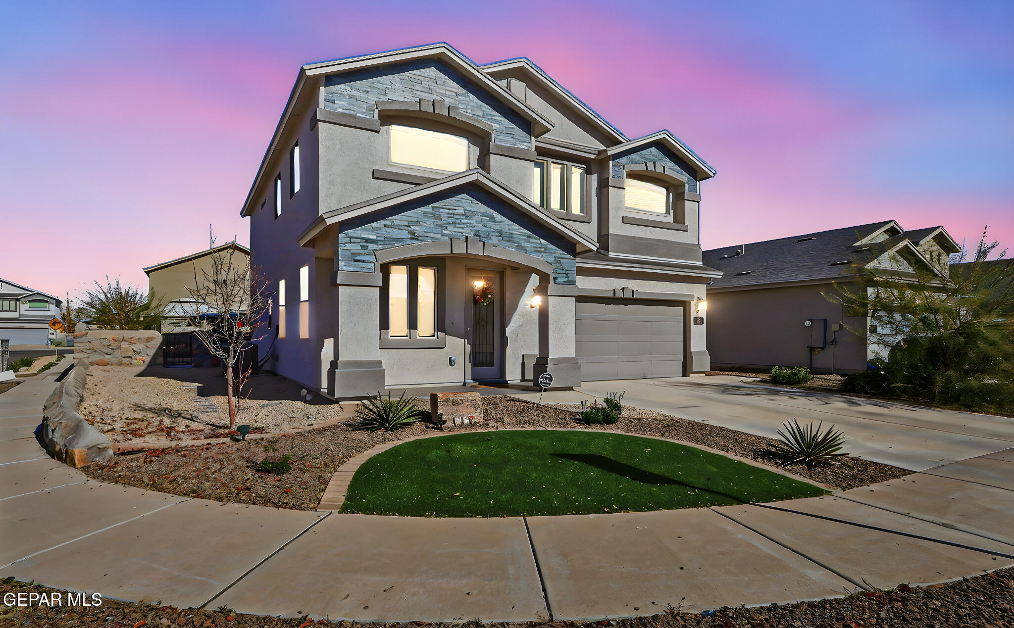 525 Issa Circle El Paso, TX 79932 - Photo 2 of 47 a front view of a house