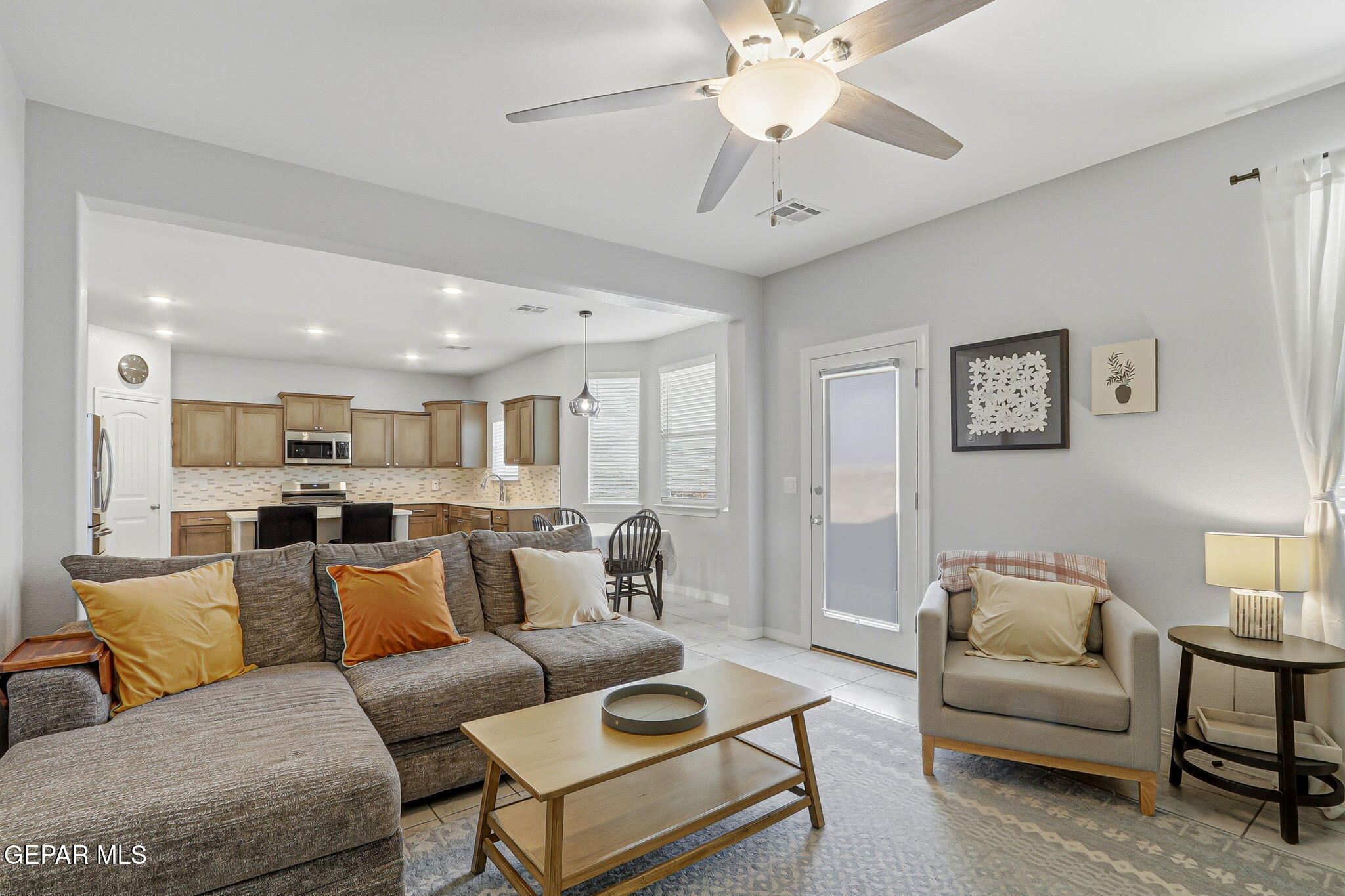 525 Issa Circle El Paso, TX 79932 - Photo 31 of 47 a living room with furniture and a view of kitchen
