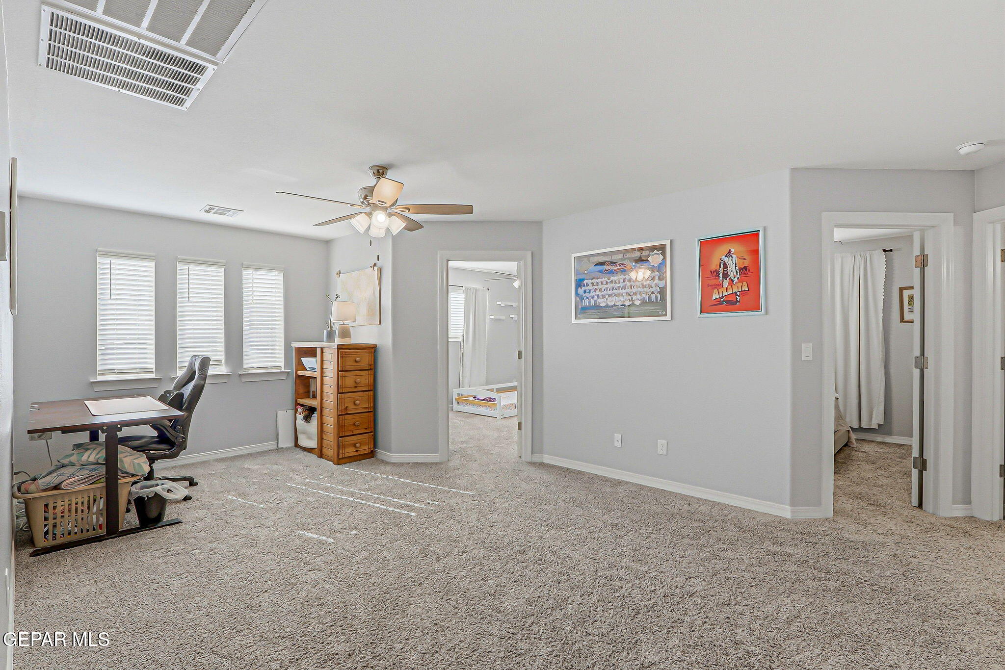 525 Issa Circle El Paso, TX 79932 - Photo 34 of 47 a view of a livingroom with workspace and a window