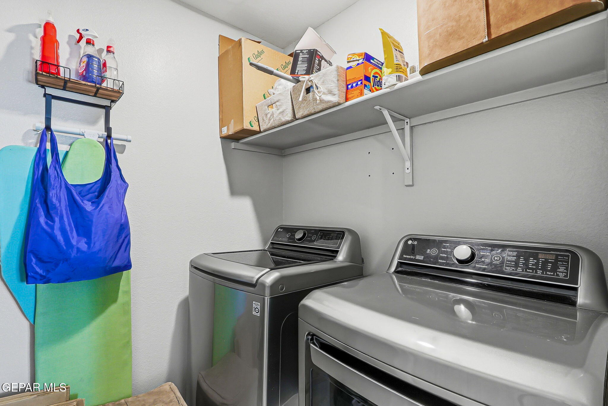 525 Issa Circle El Paso, TX 79932 - Photo 36 of 47 a utility room with dryer and washer