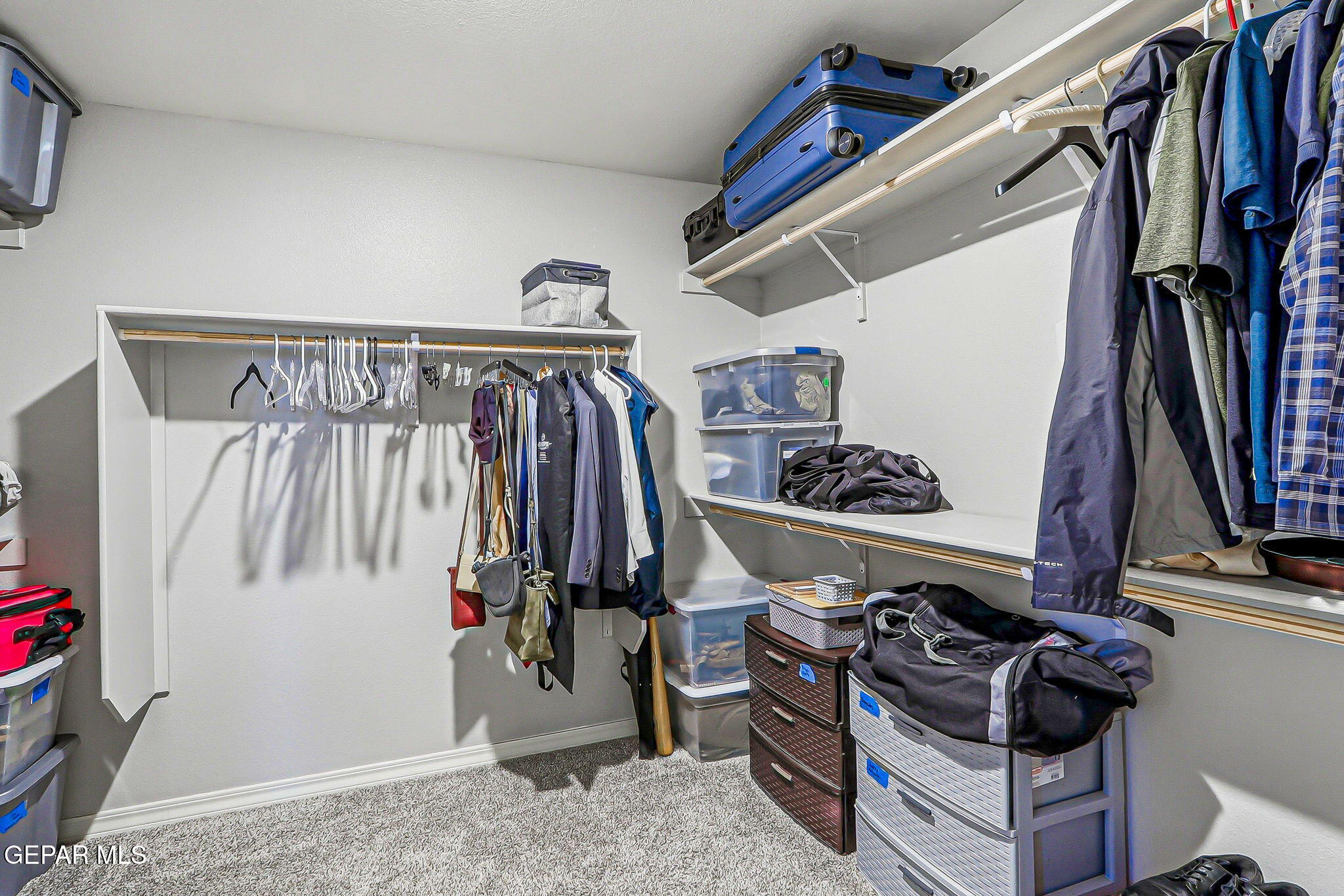 525 Issa Circle El Paso, TX 79932 - Photo 46 of 47 a view of walk in closet with clothes and shoes
