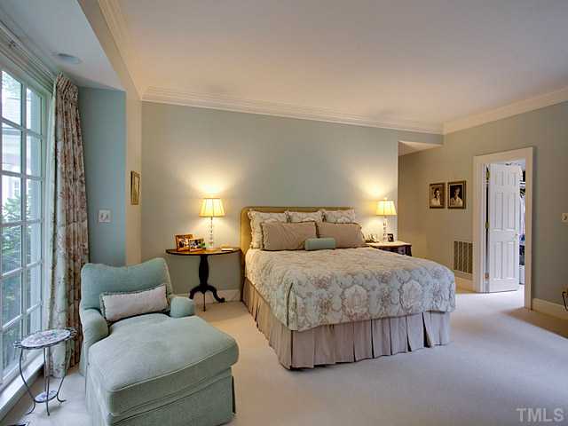 1908 Chase Court Raleigh, NC 27607 - Photo 13 of 25 a bedroom with a bed and a couch