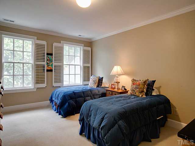 1908 Chase Court Raleigh, NC 27607 - Photo 21 of 25 a bedroom with two bed and a window