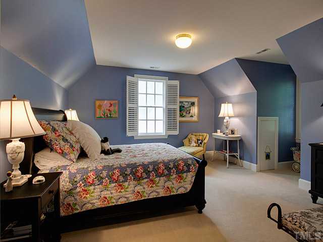 1908 Chase Court Raleigh, NC 27607 - Photo 22 of 25 a bedroom with bed or furniture and a window