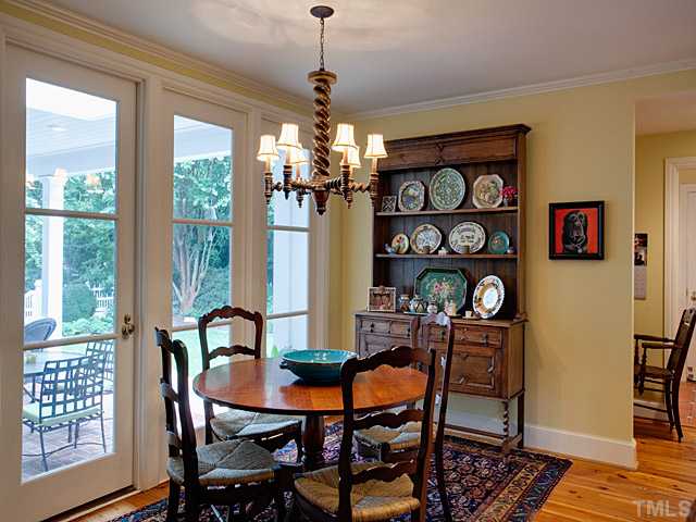 1908 Chase Court Raleigh, NC 27607 - Photo 10 of 25 a view of a dining room with furniture window and wooden floor
