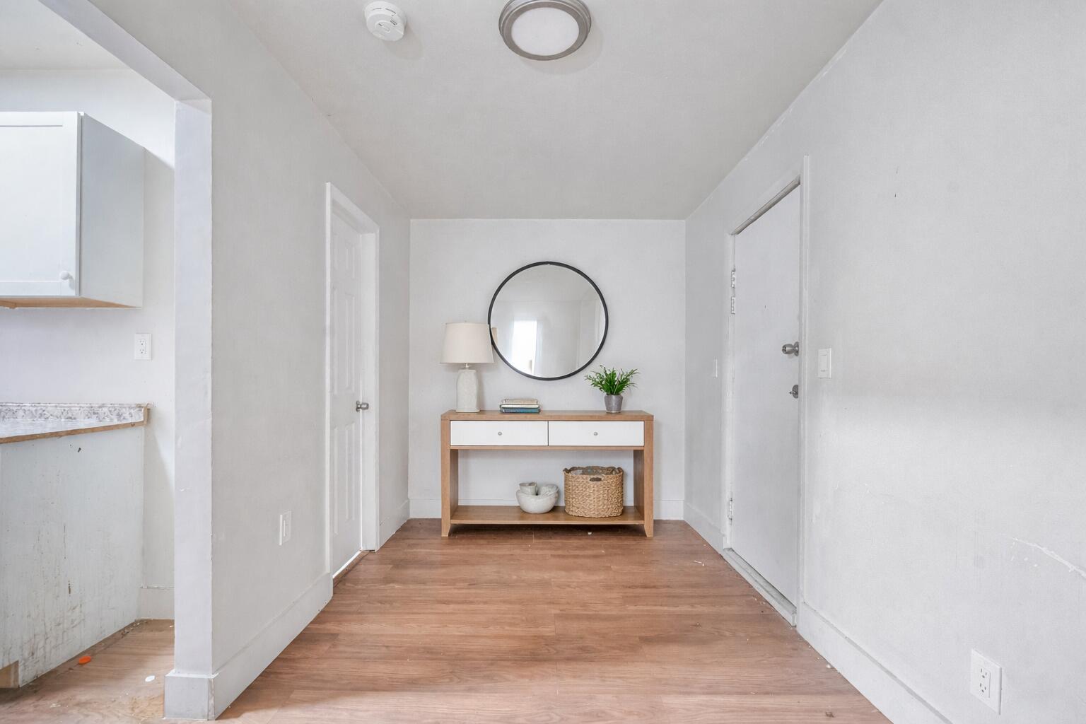 1554 Southwest 5th Street, Unit 3A Miami, FL 33135 - Photo 4 of 13 a view of a livingroom with furniture and wooden floor