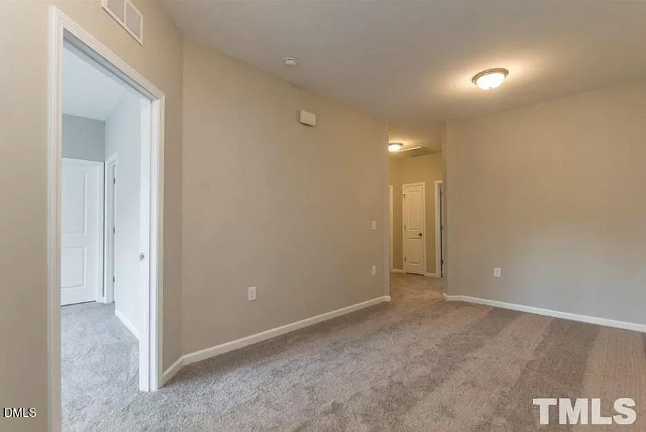 1142 Lookout Ridge Road Apex, NC 27502 - Photo 10 of 21 a view of an empty room