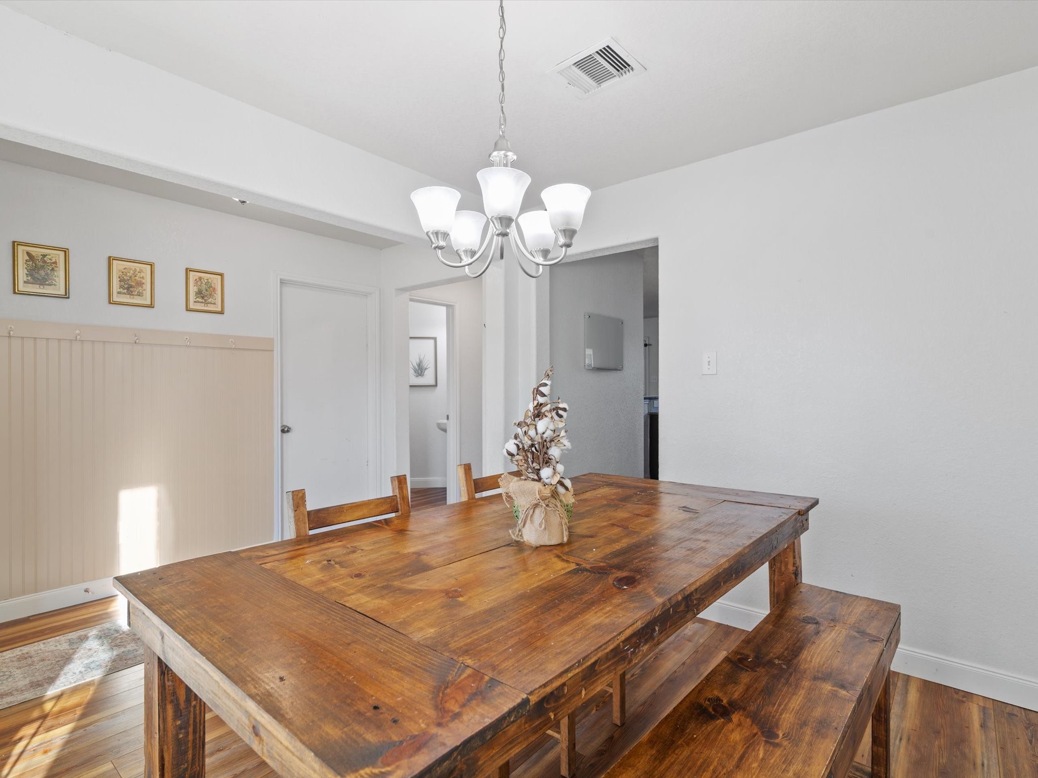 2535 Zephyr Lane Rosenberg, TX 77471 - Photo 14 of 40 a dining room with wooden floor