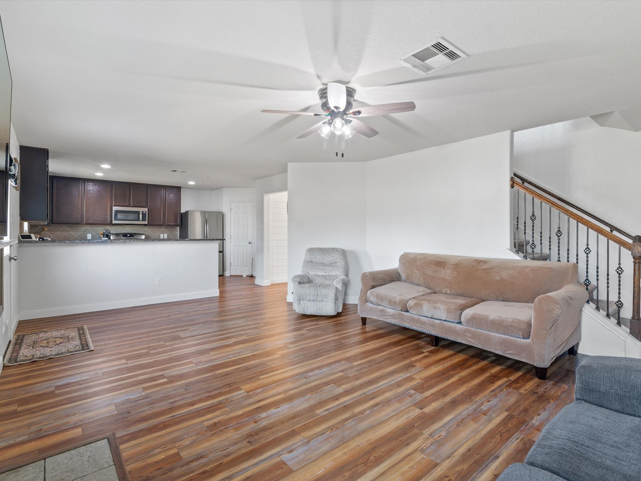 2535 Zephyr Lane Rosenberg, TX 77471 - Photo 18 of 40 a living room with furniture and kitchen view