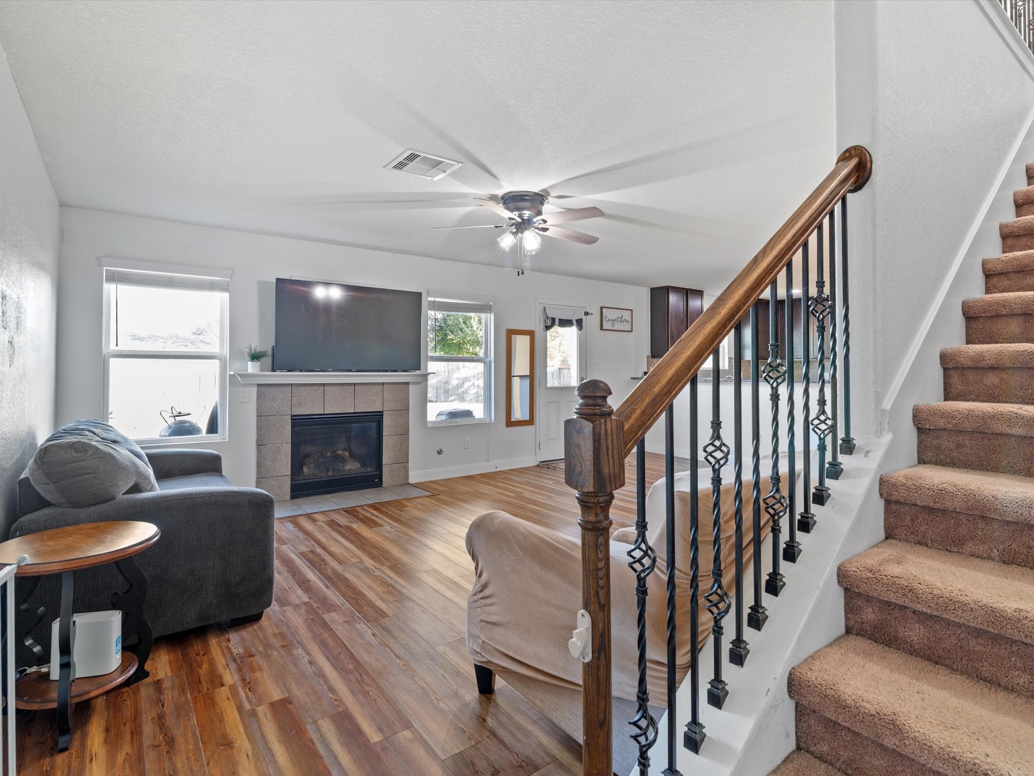 2535 Zephyr Lane Rosenberg, TX 77471 - Photo 19 of 40 a living room with furniture fireplace and a rug
