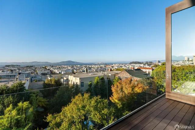 a view of a lake from a balcony