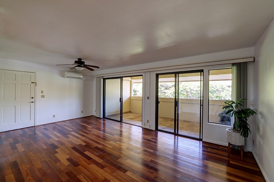 1450 South Kihei Road, Unit C203 Kihei, HI 96753 - Photo 1 of 21 a view of an empty room with glass door and a window