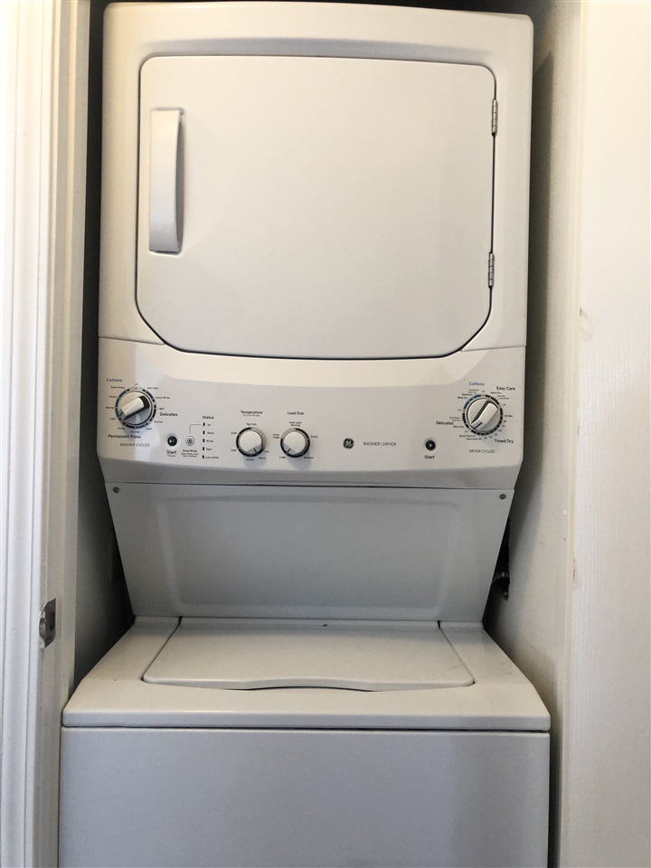 1450 South Kihei Road, Unit C203 Kihei, HI 96753 - Photo 16 of 21 a utility room with dryer and washer