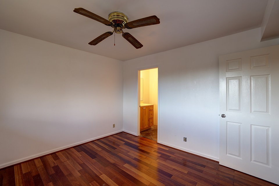1450 South Kihei Road, Unit C203 Kihei, HI 96753 - Photo 10 of 21 wooden floor in an empty room