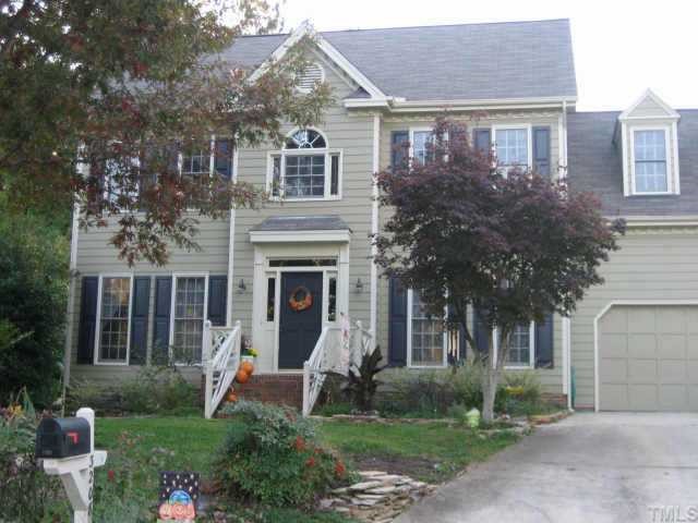 3208 Claverack Way Raleigh, NC 27613 - Photo 1 of 1 a front view of a house with a yard and garage
