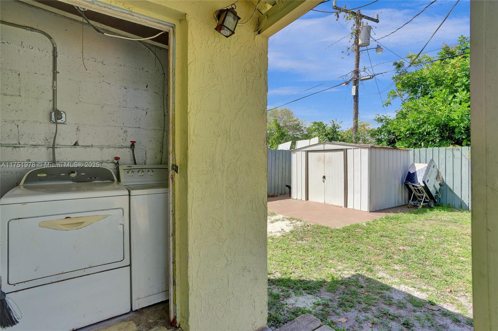 2091 Rutland Street Opa-Locka, FL 33054 - Photo 17 of 25 a view of a backyard of a house