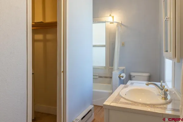 a bathroom with a sink and a toilet