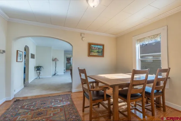 a view of a dining room with furniture