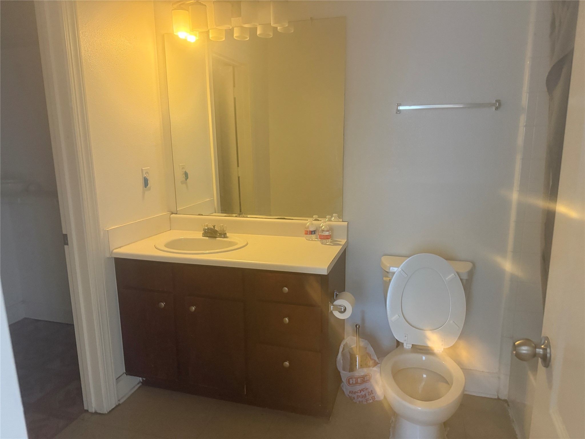 1901 Crossing Place, Unit 1201A Austin, TX 78741 - Photo 11 of 13 Full bathroom with vanity and toilet