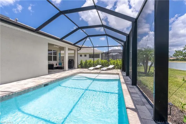 a view of swimming pool with a porch