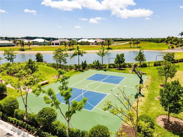 a view of a swimming pool and an outdoor space