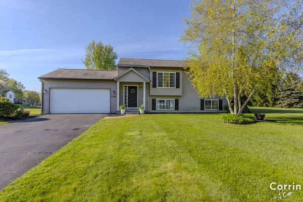 $365,000 | 1176 Treeway Drive Northwest, Sparta, MI 49345
