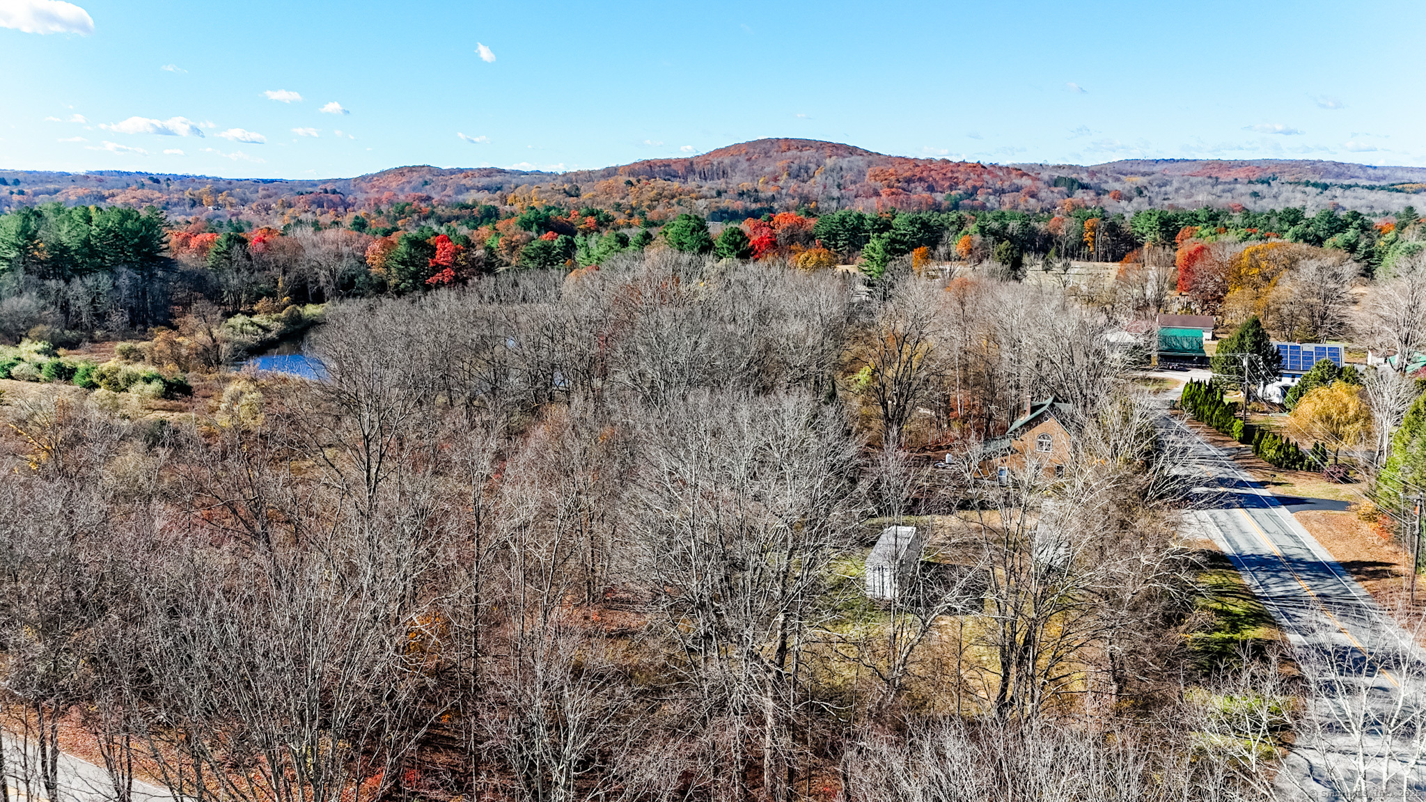4 Jerusalem Road Windham, CT 06280 - Photo 12 of 37 a view of a lush green field with mountains in the background