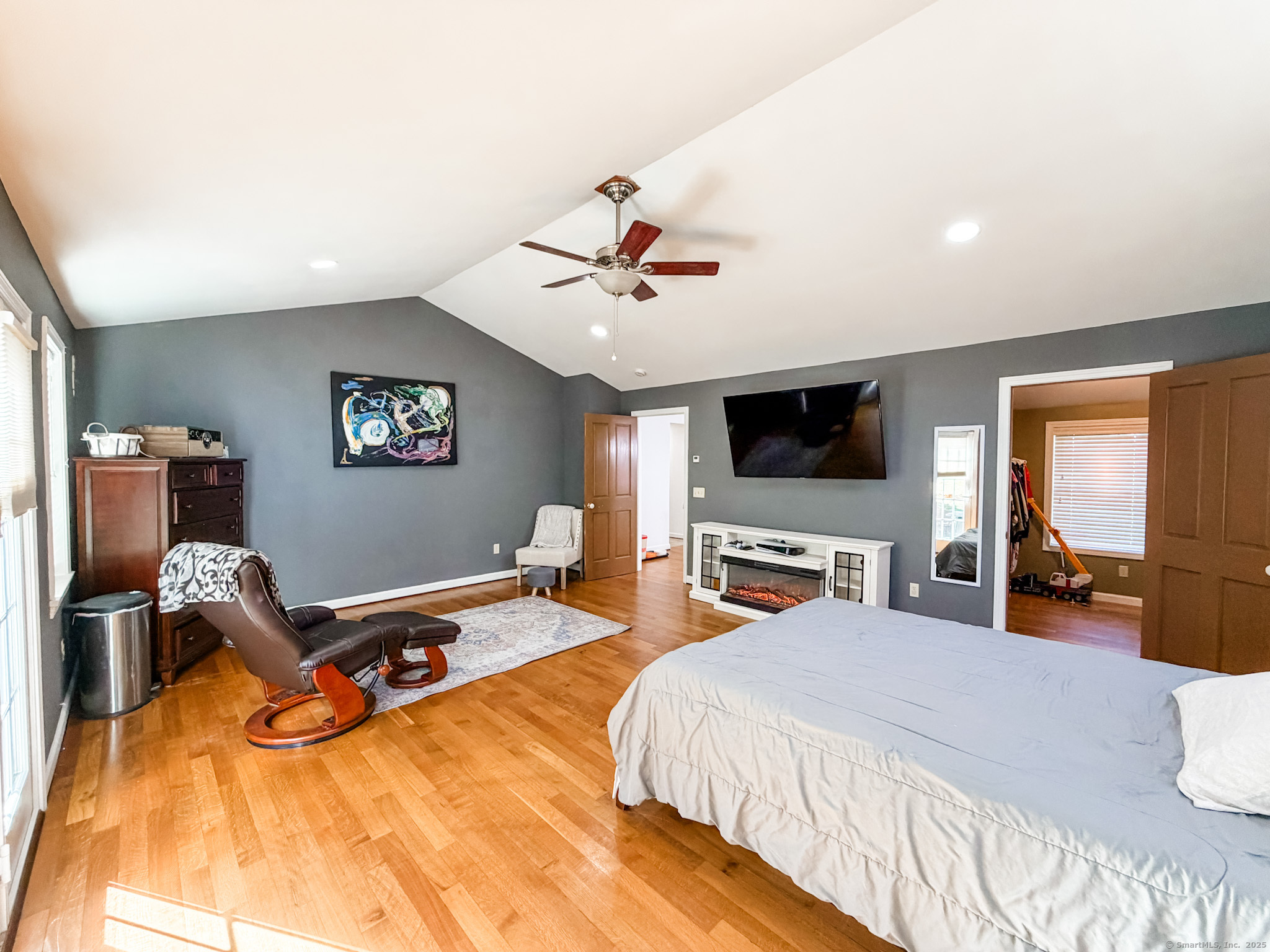 4 Jerusalem Road Windham, CT 06280 - Photo 14 of 37 a bedroom with a bed and a flat screen tv