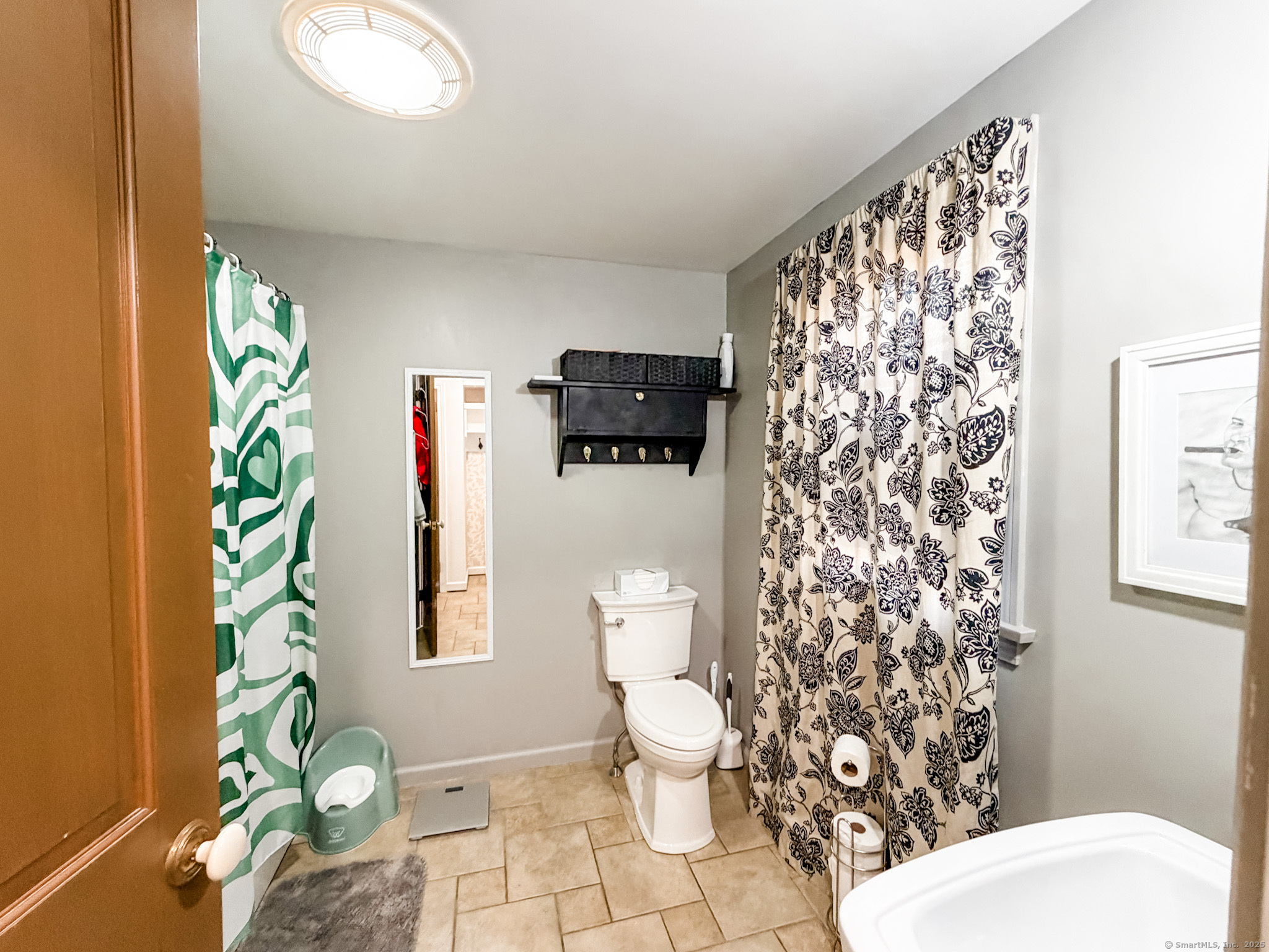 4 Jerusalem Road Windham, CT 06280 - Photo 15 of 37 a white toilet sitting next to a shower curtain