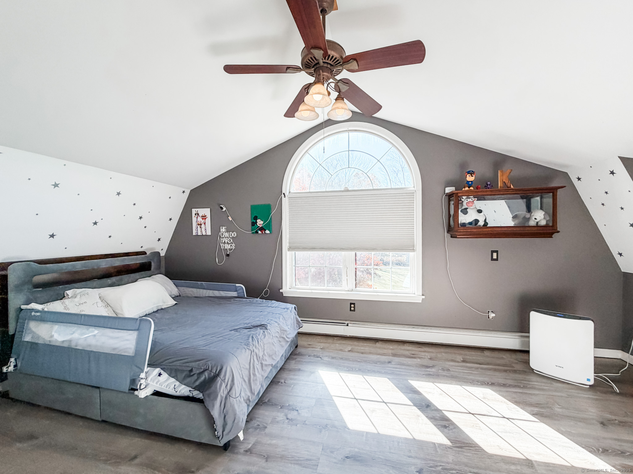 4 Jerusalem Road Windham, CT 06280 - Photo 22 of 37 a bedroom with a bed and a chandelier