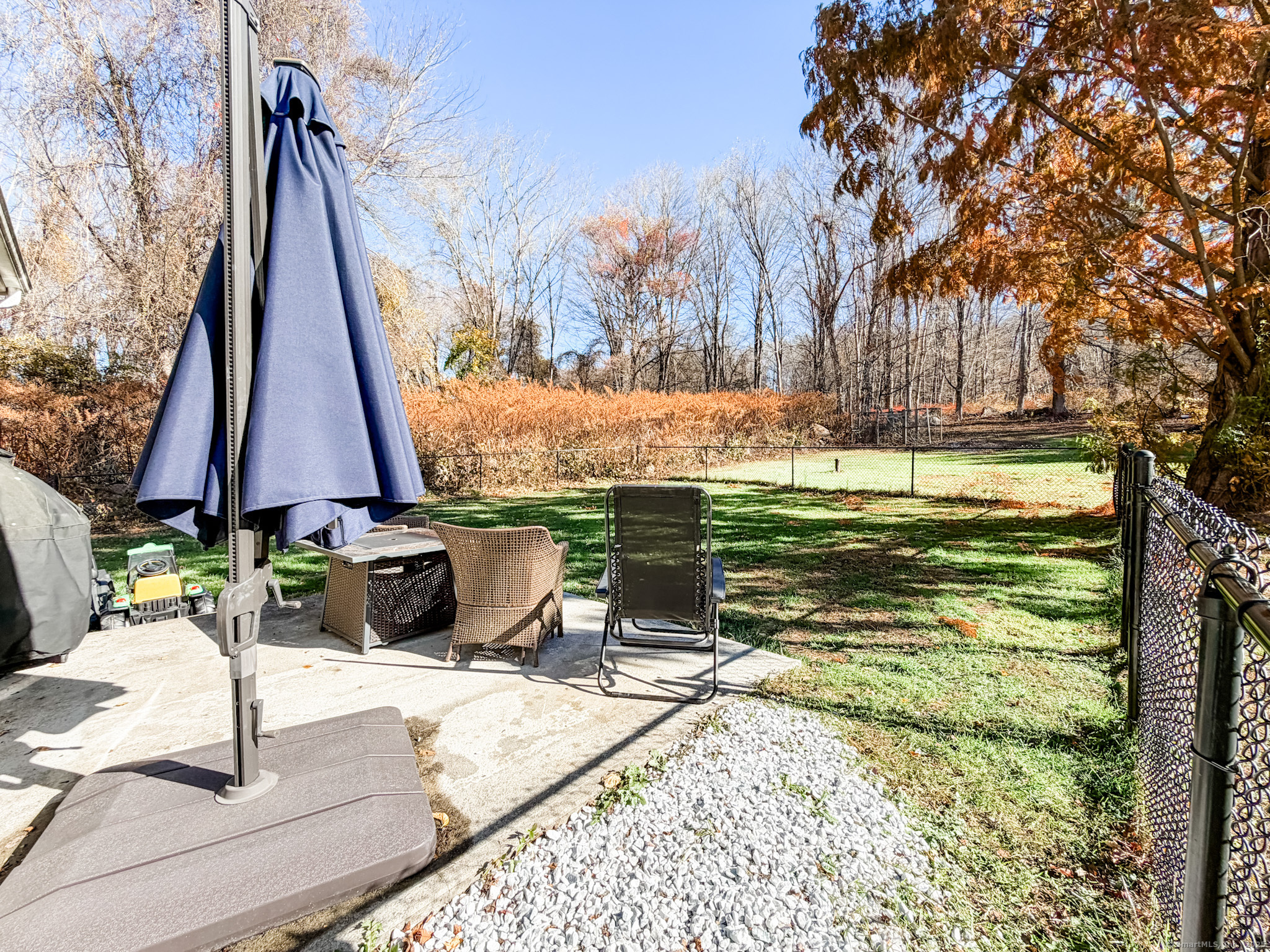 4 Jerusalem Road Windham, CT 06280 - Photo 27 of 37 a view of a fountain with a bench in the patio