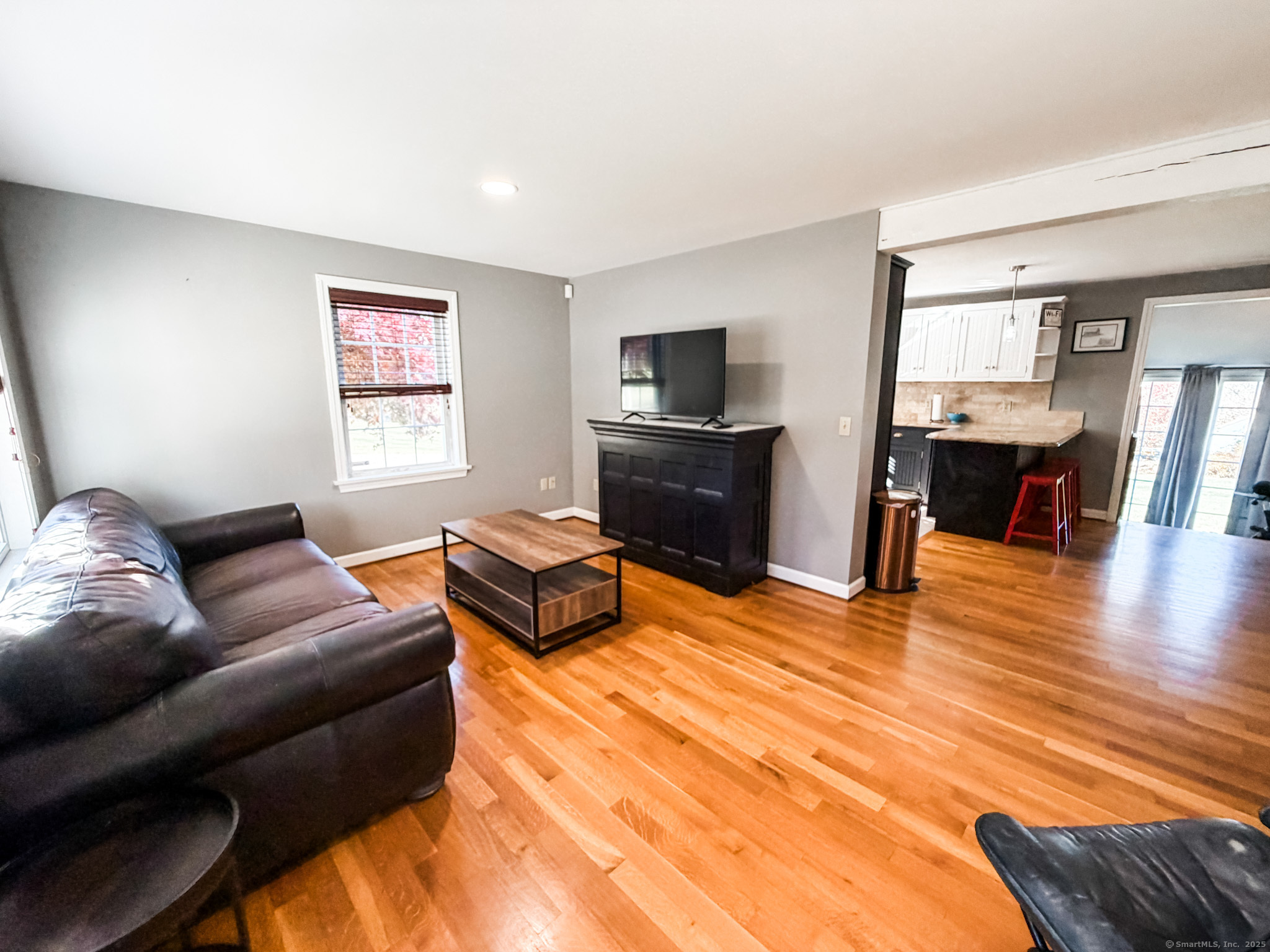 4 Jerusalem Road Windham, CT 06280 - Photo 30 of 37 a living room with furniture and a flat screen tv