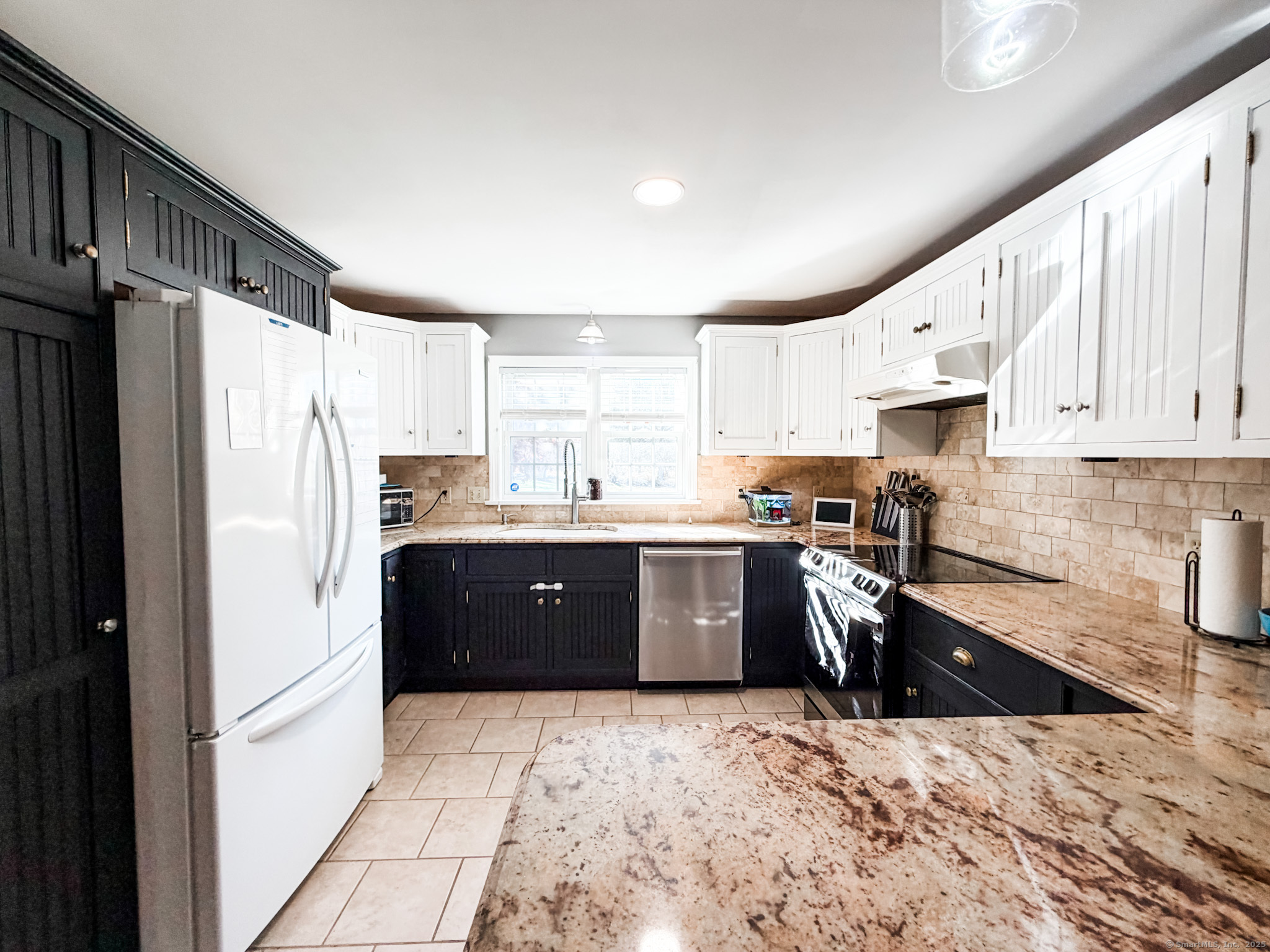 4 Jerusalem Road Windham, CT 06280 - Photo 3 of 37 a kitchen with stainless steel appliances a refrigerator sink and cabinets