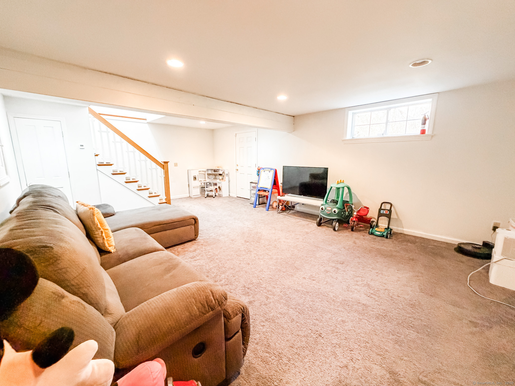 4 Jerusalem Road Windham, CT 06280 - Photo 32 of 37 a living room with furniture and a flat screen tv