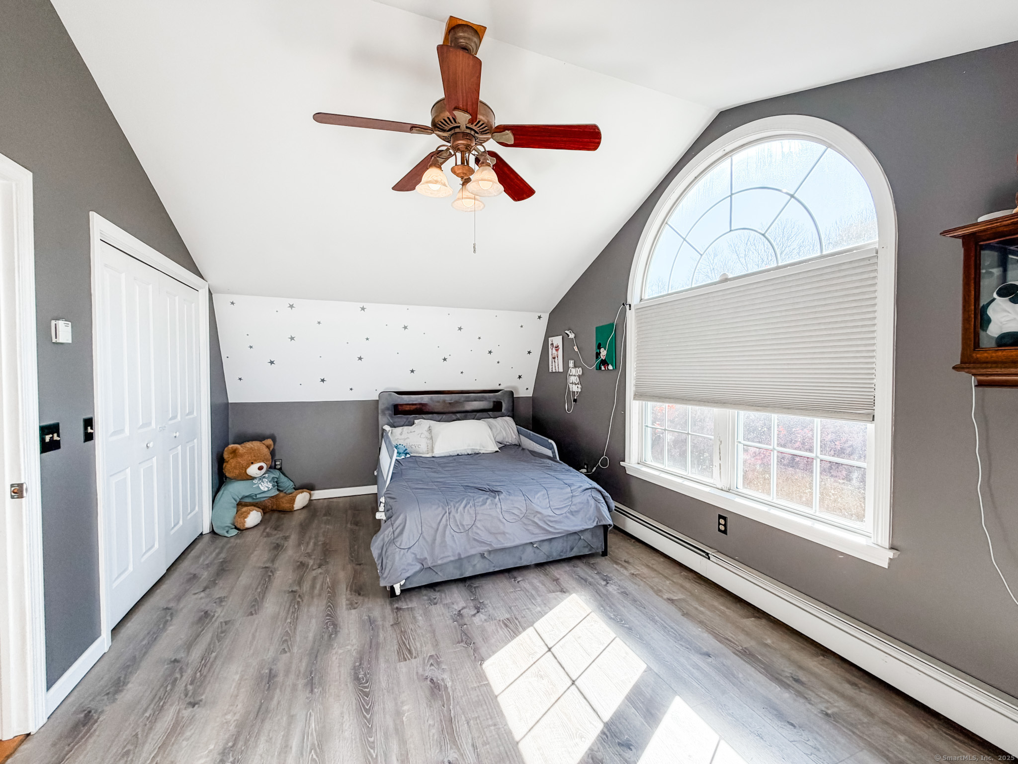 4 Jerusalem Road Windham, CT 06280 - Photo 35 of 37 a bedroom with a bed and wooden floor