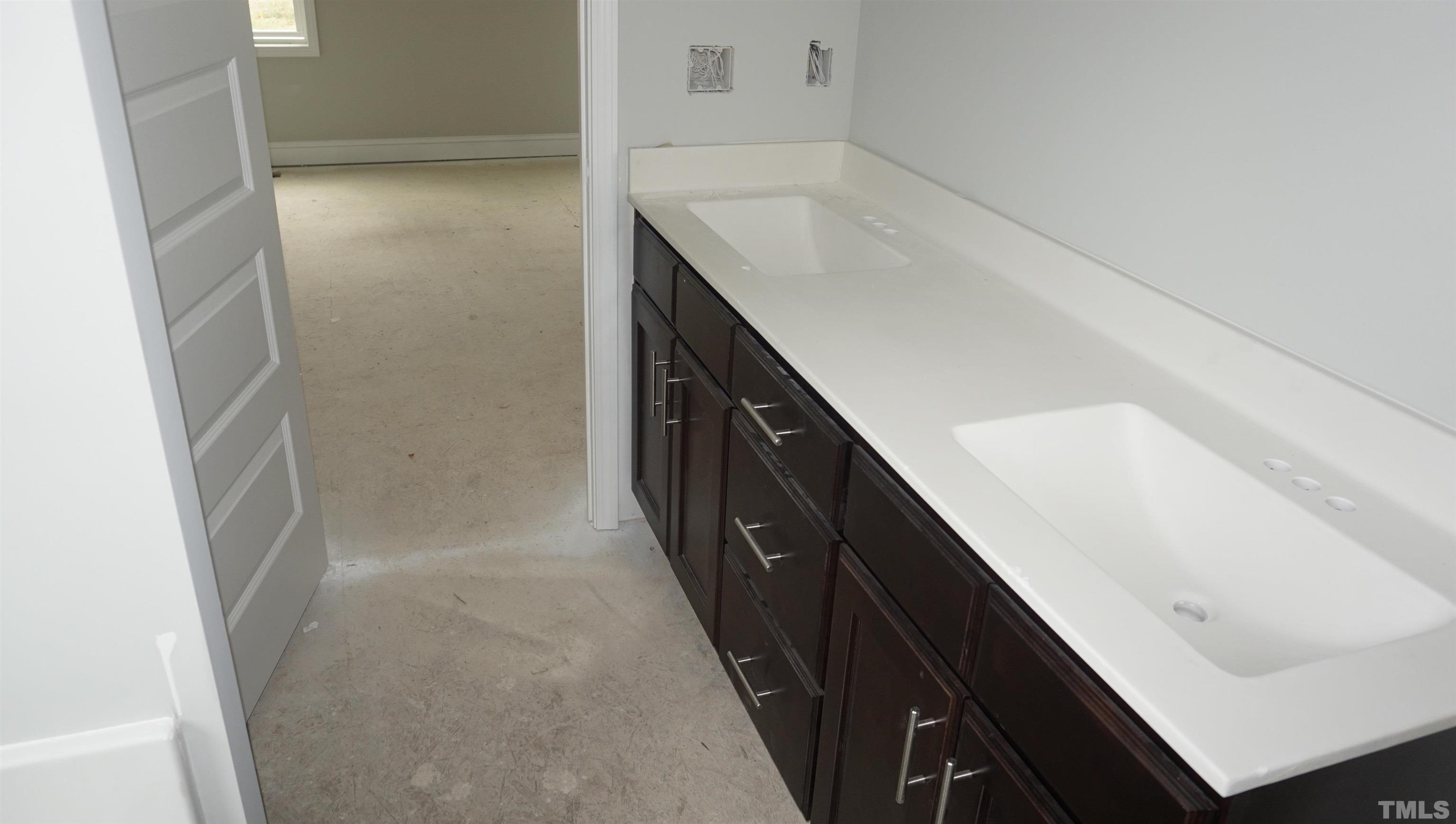 810 Mulberry Road Spring Hope, NC 27882 - Photo 15 of 25 a bathroom with a shower and a sink