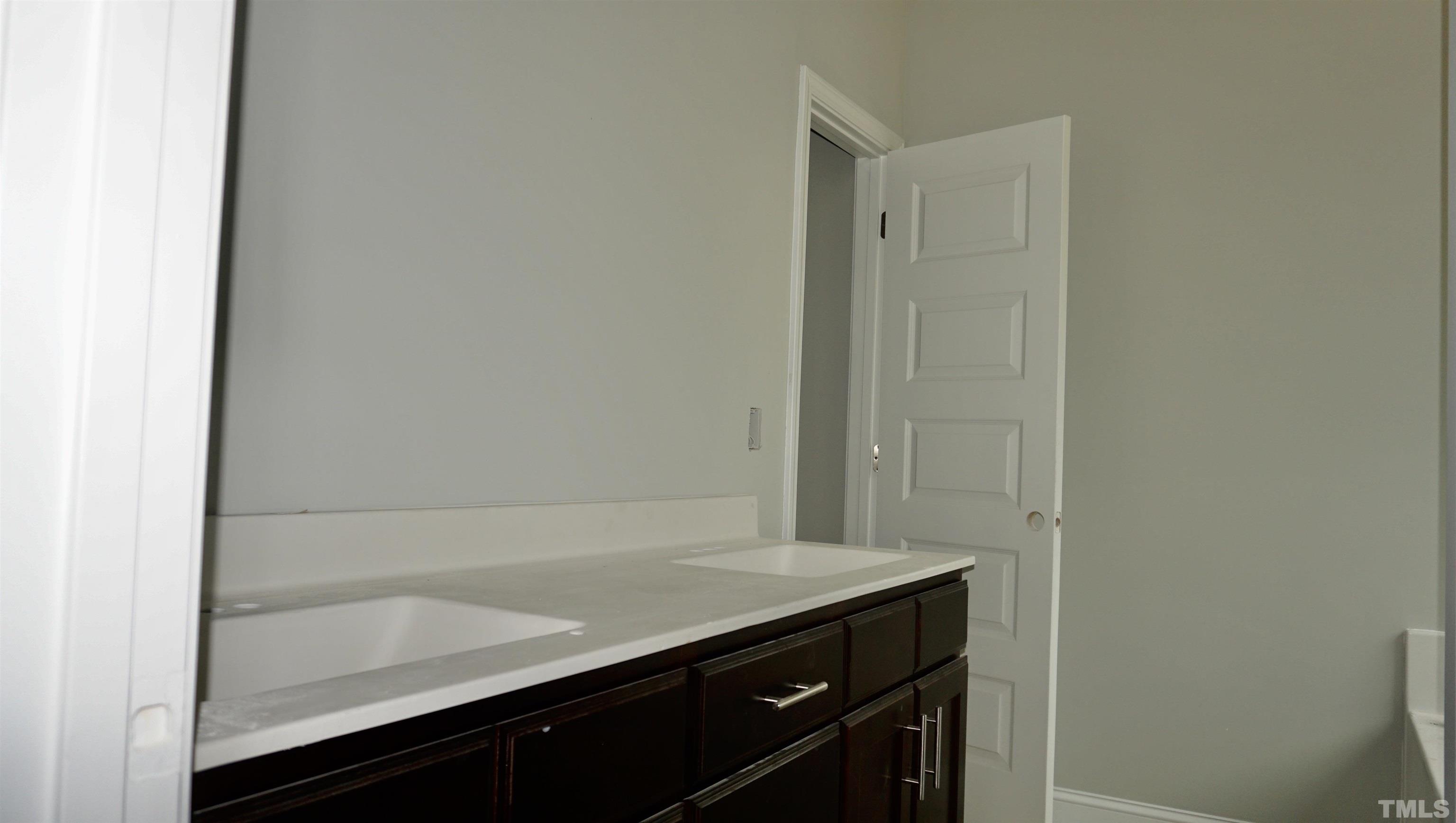 810 Mulberry Road Spring Hope, NC 27882 - Photo 8 of 25 a bathroom with a sink and a shower