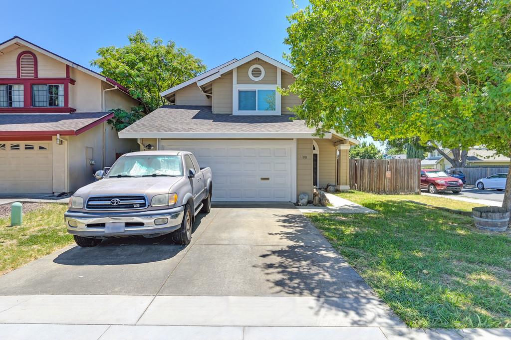 a car parked in front of a house