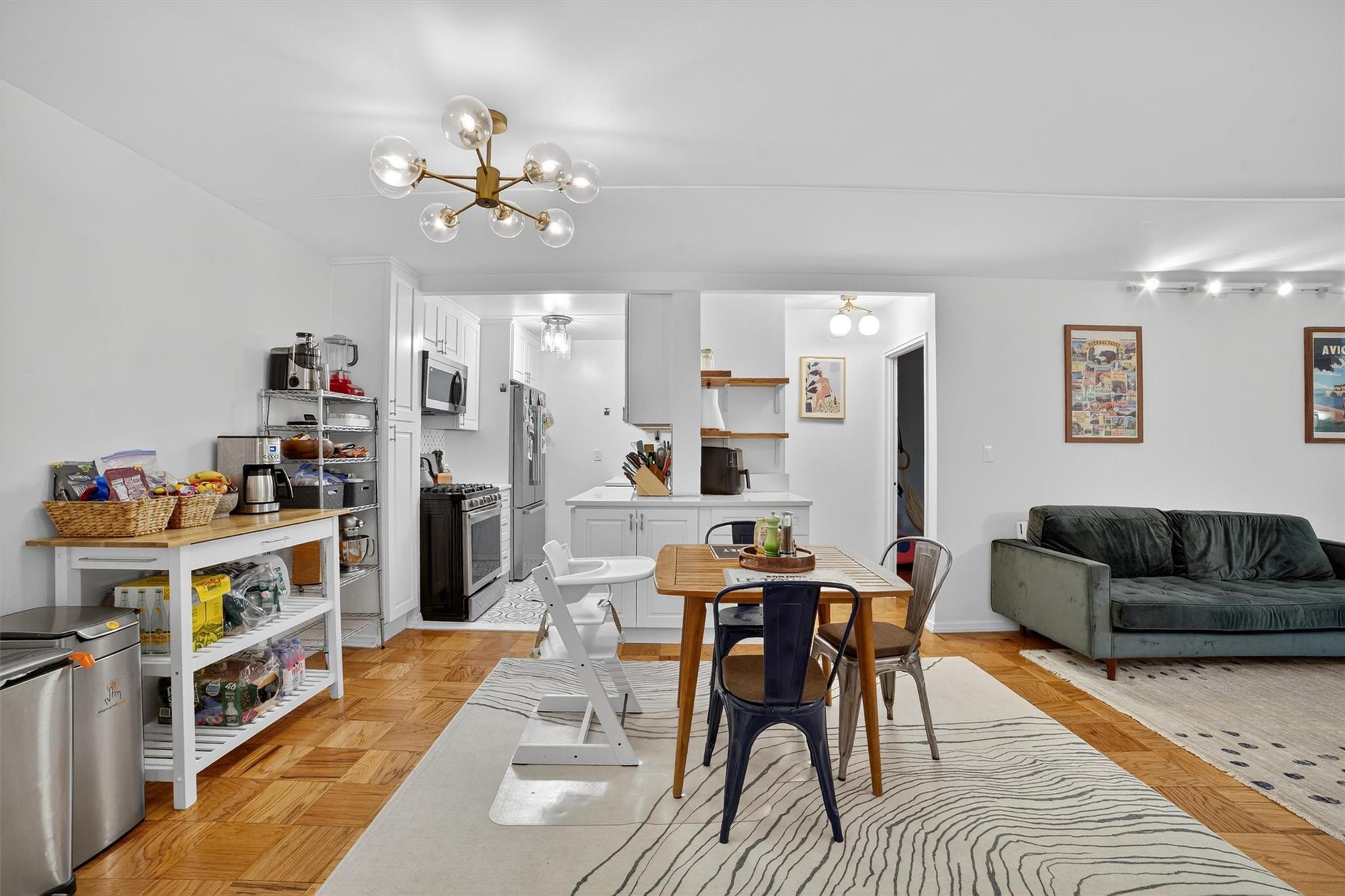 108 Sagamore Road, Unit 5F Tuckahoe, NY 10707 - Photo 12 of 33 Dining space with a chandelier
