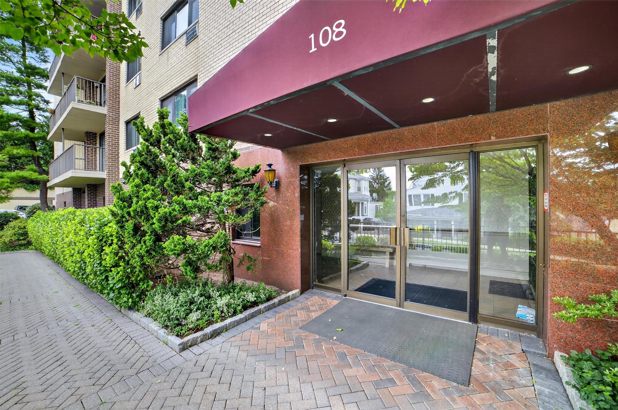 108 Sagamore Road, Unit 5F Tuckahoe, NY 10707 - Photo 5 of 33 View of exterior entry with brick siding