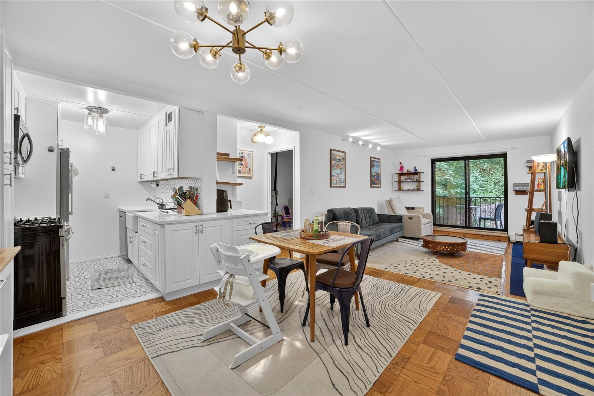 108 Sagamore Road, Unit 5F Tuckahoe, NY 10707 - Photo 8 of 33 Dining room featuring a chandelier