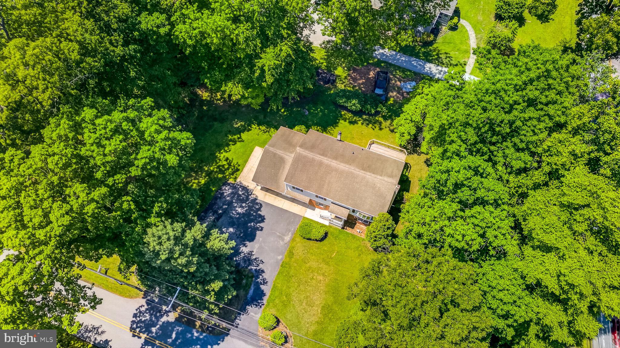 3701 Ebright Road Chadds Ford, PA 19317 - Photo 14 of 45 an aerial view of a house with swimming pool and garden space