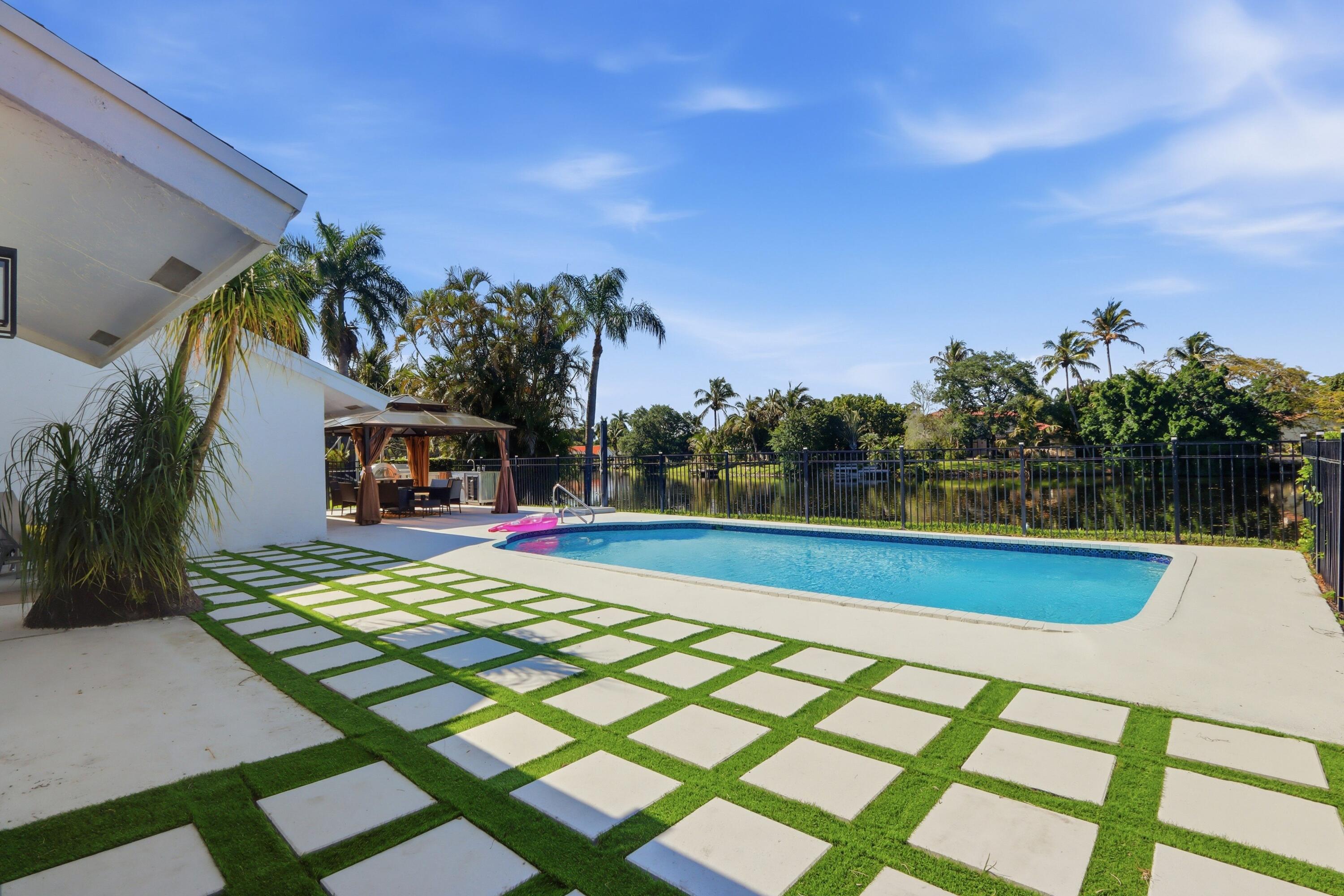 12725 Kingsway Road Wellington, FL 33414 - Photo 30 of 33 048-017-Pool Area-4200x2800